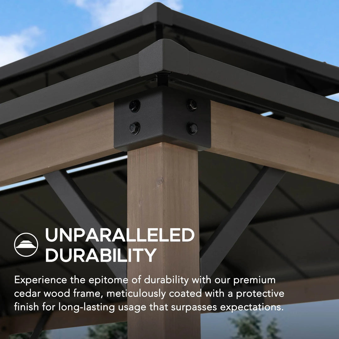 Wooden pergola structure with metal brackets against a blue sky, emphasizing durability.