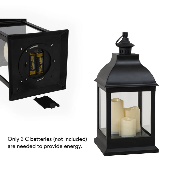Black lantern with battery compartment and LED candles on a white background